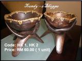 This decoration comes in a set of two units. A wooden bowl and a leg. This wooden bowl carved with simple patterns and woven in the sides to look more attractive.